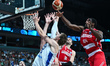 Lauri Markkanen of Finland competes with Kamar Baldwin and Duda Sanadze of Georgia during...
