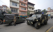 Armored vehicles are deployed onto the street of Kathmandu, Nepal, on September 10, 2025,...
