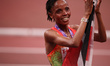 Beatrice Chebet (KEN) celebrates winning gold in the 10,000m during the World Athletics Ch...