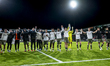 Players of PSV celebrate the goal and the win during the match NEC - PSV at the De Goffert...