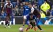 John McGinn #7 of Aston Villa F.C fouls Merlin Rohl #34 of Everton F.C. during the Premier...