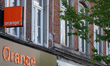 The storefront signage of the telecommunications company Orange is in Verviers, Belgium, o...