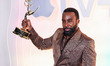 Tramell Tillman, winner of the Outstanding Supporting Actor In A Drama Series award for 'S...