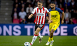 PSV Eindhoven midfielder Joey Veerman and Union Saint-Gilloise midfielder Adem Zorgane pla...