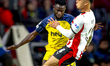 Union Saint-Gilloise midfielder Ousseynou Niang and PSV Eindhoven defender Sergino Dest pl...