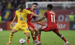 Razvan Marin and Stephen Eustaquio play during the International Friendly match between Ro...