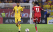 Ali Ahmed and Marius Marin play during the International Friendly match between Romania an...