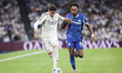 Federico Valverde of Real Madrid and Pierre-Emerick Aubameyang of Marseille fight for the...