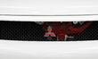 The Mitsubishi logo is seen on a car during the Tuning Show EXPO in Krakow, Poland, on Sep...