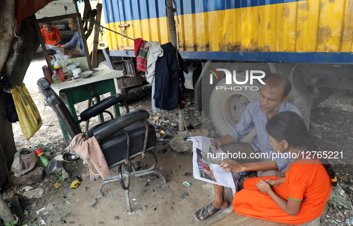 Barber Father Teaching Daughter By The Roadside