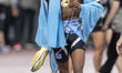 Busang Collen Kebinatshipi of Botswana celebrates his victory and winning the gold medal a...