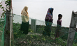 Rahima and her family visit the grave of her son, Sakib Mia, who dies years ago, near the...
