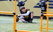 A Hamilton Tiger-Cats player warms up during the Canadian Football League team's practice...