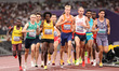George Mills of Great Britain sets the pace in the Men's 5000 meters heats during the Worl...