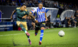 Top Oss forward Joshua Zimmerman and FC Eindhoven defender Terrence Douglas play during th...