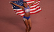 Jasmine Jones of the USA celebrates after winning silver in the Women's 400m hurdles final...