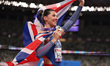 Amy Hunt of Great Britain celebrates with a Union flag after winning the silver in the Wom...
