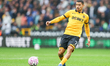 Andre passes the ball during the Premier League match between Wolverhampton Wanderers and...