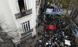 Former Argentinian President Cristina Fernandez de Kirchner greets her supporters from the...