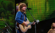 Jesse Welles performs during the Farm Aid 40 Music Festival in Minneapolis, Minnesota, on...