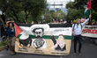 People participate in a rally near the Israeli Embassy in Mexico City, Mexico, on Septembe...