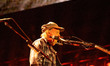 Neil Young performs during the Farm Aid 40 Music Festival in Minneapolis, Minnesota, on Se...