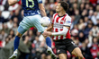 AFC Ajax Amsterdam defender Youri Baas and PSV Eindhoven forward Ivan Perisic play during...