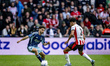 AFC Ajax Amsterdam forward Raul Moro and PSV Eindhoven defender Anass Salah-Eddine partici...