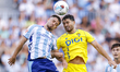 In Malaga, Spain, on September 21, 2025, Sergio Ortuno of Cadiz CF competes for the ball w...