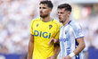 Garcia Pascual of Cadiz CF and Javi Montero of Malaga CF participate in the La Liga Hyperm...