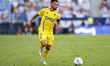 Suso of Cadiz CF runs with the ball during the La Liga Hypermotion match between Malaga CF...