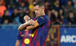 Robert Lewandowski puts on the captain armband during the match between FC Barcelona and G...