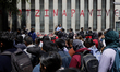 Normal school students from Ayotzinapa accompany the mothers and fathers of the 43 missing...
