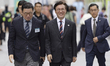 Prime Minister Kim Min-seok (center) enters the venue of the 2025 Restart Job Fair at Gwan...