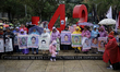 Mothers and fathers of the 43 missing Ayotzinapa students march to the Zocalo in Mexico Ci...
