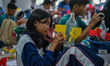 Participants make rockets from plastic bottles during the Sundial Water Rocket Championshi...