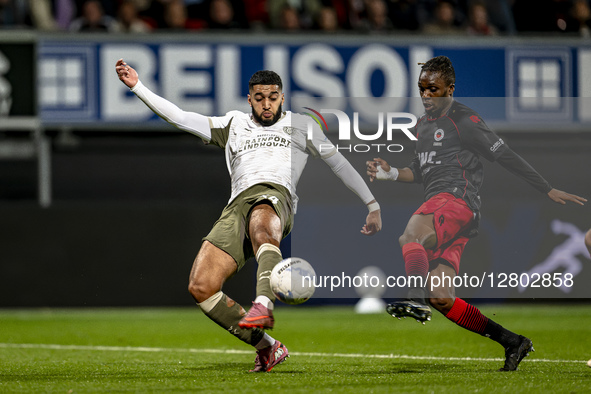 PSV Eindhoven midfielder Ismael Saibari and Excelsior player Arthur Zagre play during the match between Excelsior Rotterdam and PSV Eindhove...