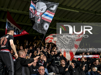 Supporters of PSV attend the match between Excelsior Rotterdam and PSV Eindhoven at Stadium Woudestein for the Dutch Vriendenloterij Eredivi... by EYE4images/NurPhoto