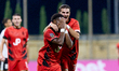 Joseph Mbong of Hamrun Spartans gestures in celebration with teammate Mouad El Fanis after...