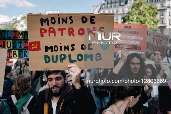 Protesters hold placards as they march during the demonstration ''Climate, Justice, Freedoms'' to protest against the Duplomb law, the imple...