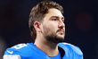 DETROIT,MICHIGAN-SEPTEMBER 14: Detroit Lions long snapper Hogan Hatten (49) walks off of t...