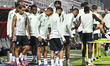 Al Ahli Saudi FC players warm up during a training session ahead of the AFC Champions Leag...