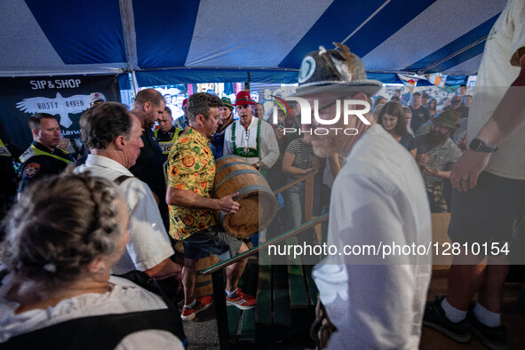 People attend Oktoberfest celebrations in New Glarus, Wisconsin, USA, on September 27, 2025, in the village known as ''America's Little Swit...