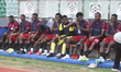 Nigeria's Remo Stars players sit on the bench as they progress to the next round after bea...