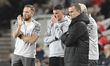 Rob Edwards, Middlesbrough Manager, discusses tactics with Assistant Head Coaches Ali Vive...