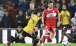Alan Browne of Middlesbrough is under pressure from Tatsuki Seko of Stoke City during the...