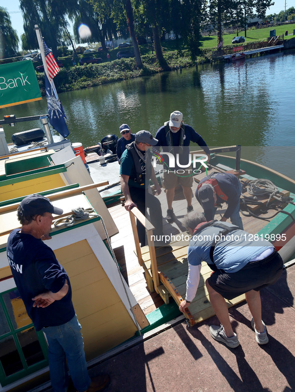 The Seneca Chief crew readies the boat for public tours. This is a period replica of the craft that takes Governor DeWitt Clinton down the E...