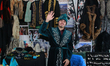 A man greets at his stand of typical Kazakh products during the Tlalpan Embraces the World...