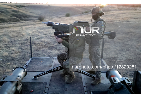 Soldiers of the 39th Separate Coastal Defense Brigade carry out a combat mission with the French short-range ''Mistral'' air defense system...