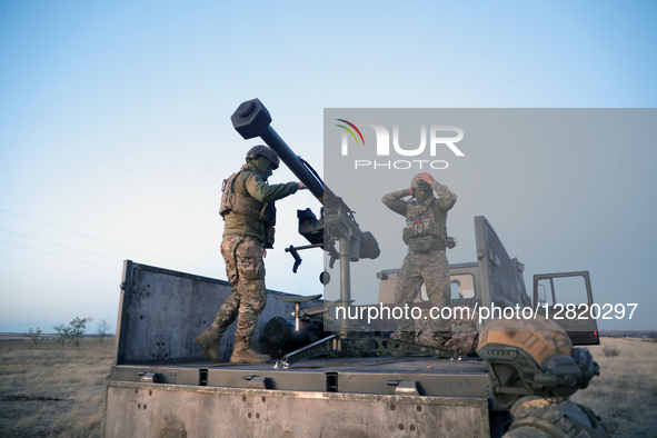 Soldiers of the 39th Separate Coastal Defense Brigade prepare the French short-range ''Mistral'' air defense system for operation in the Khe...